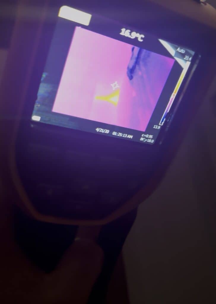 Thermal imaging camera showing a cold streak inside a wine cellar wall